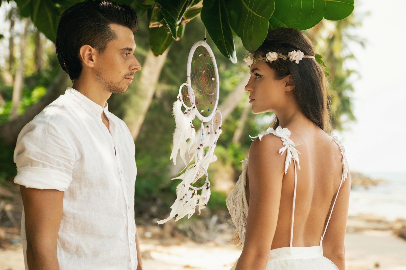 Just married couple is celebrating their wedding on the beach